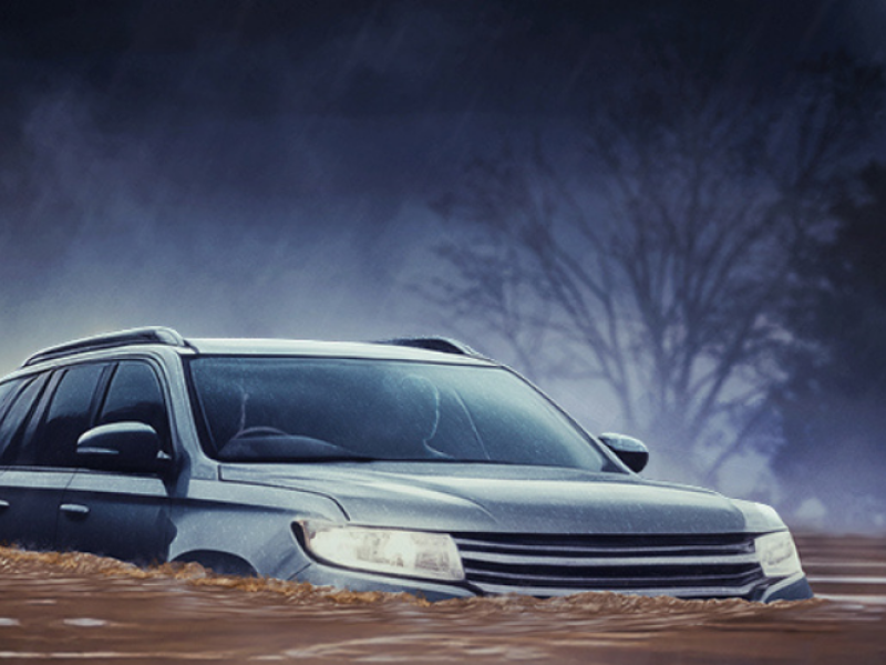 If it's flooded, forget it image of car in flood water.